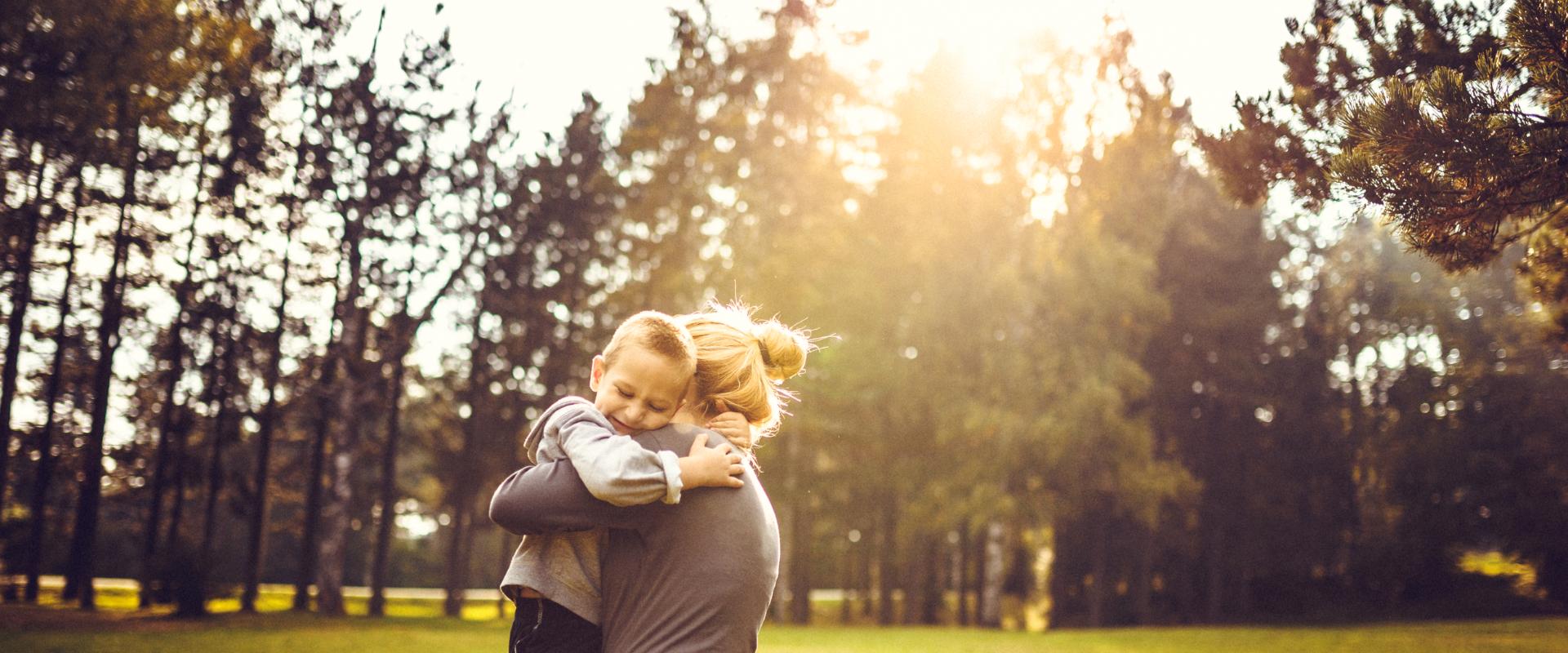 Mom and son hugging