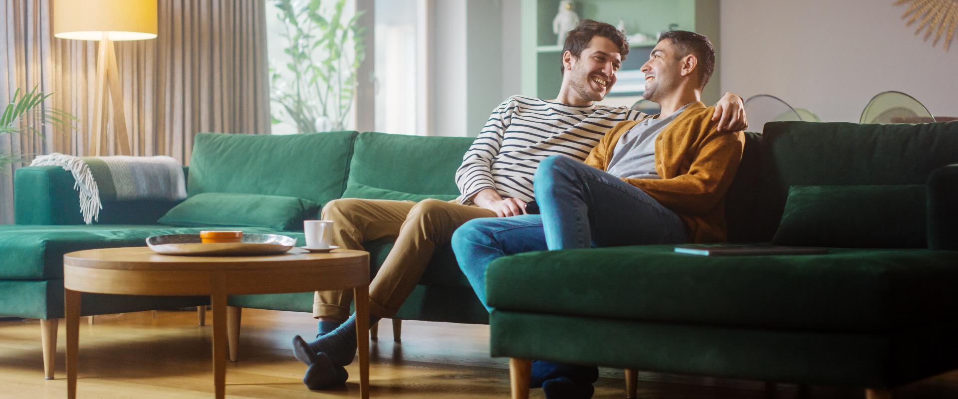 Couple sitting on a couch.